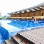 Modern Style Studio Apartment At Azalea Suites With City View By Travelio